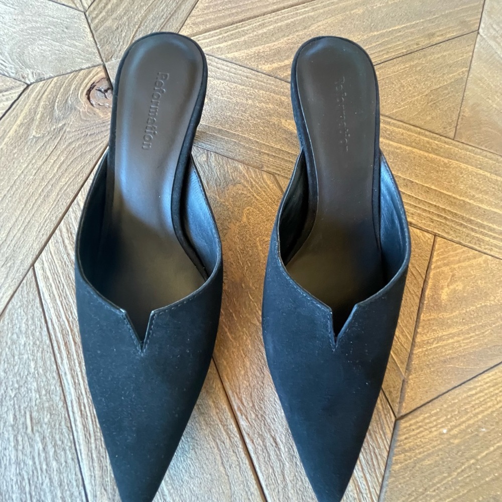 Reformation black kitten heel mules.